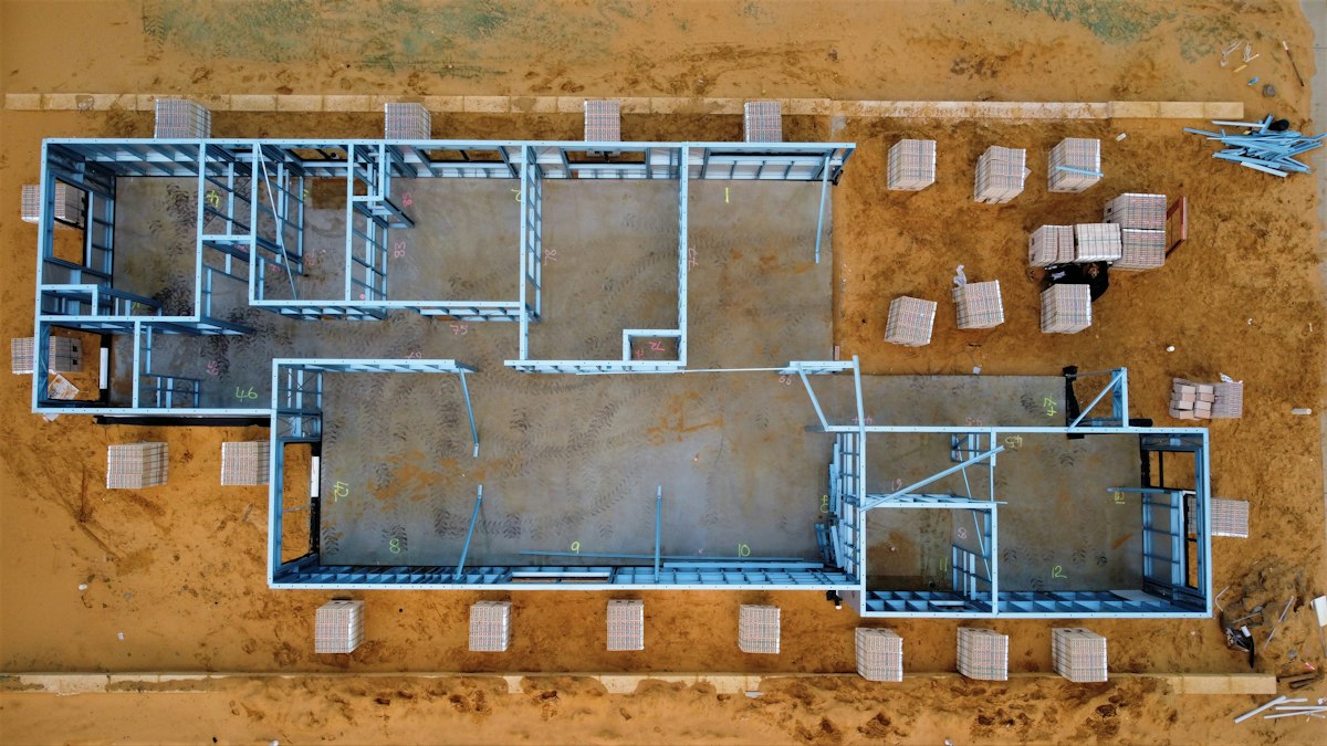 House layout from above: Bird’s-eye view · construction in progress